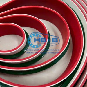 Băng tải đúc cao su đỏ gắn gân định hướng